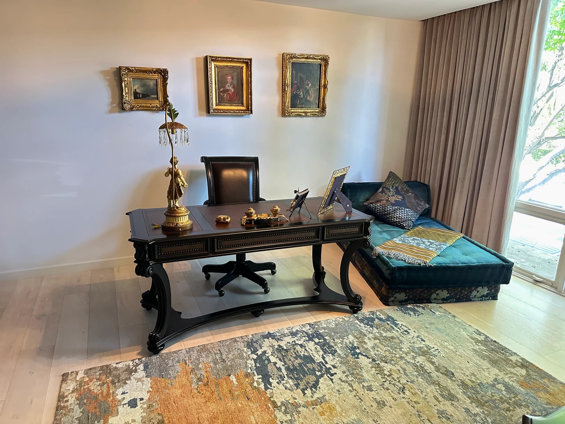 Executive home office with ornate desk, velvet chaise, and detailed surface care after residential cleaning