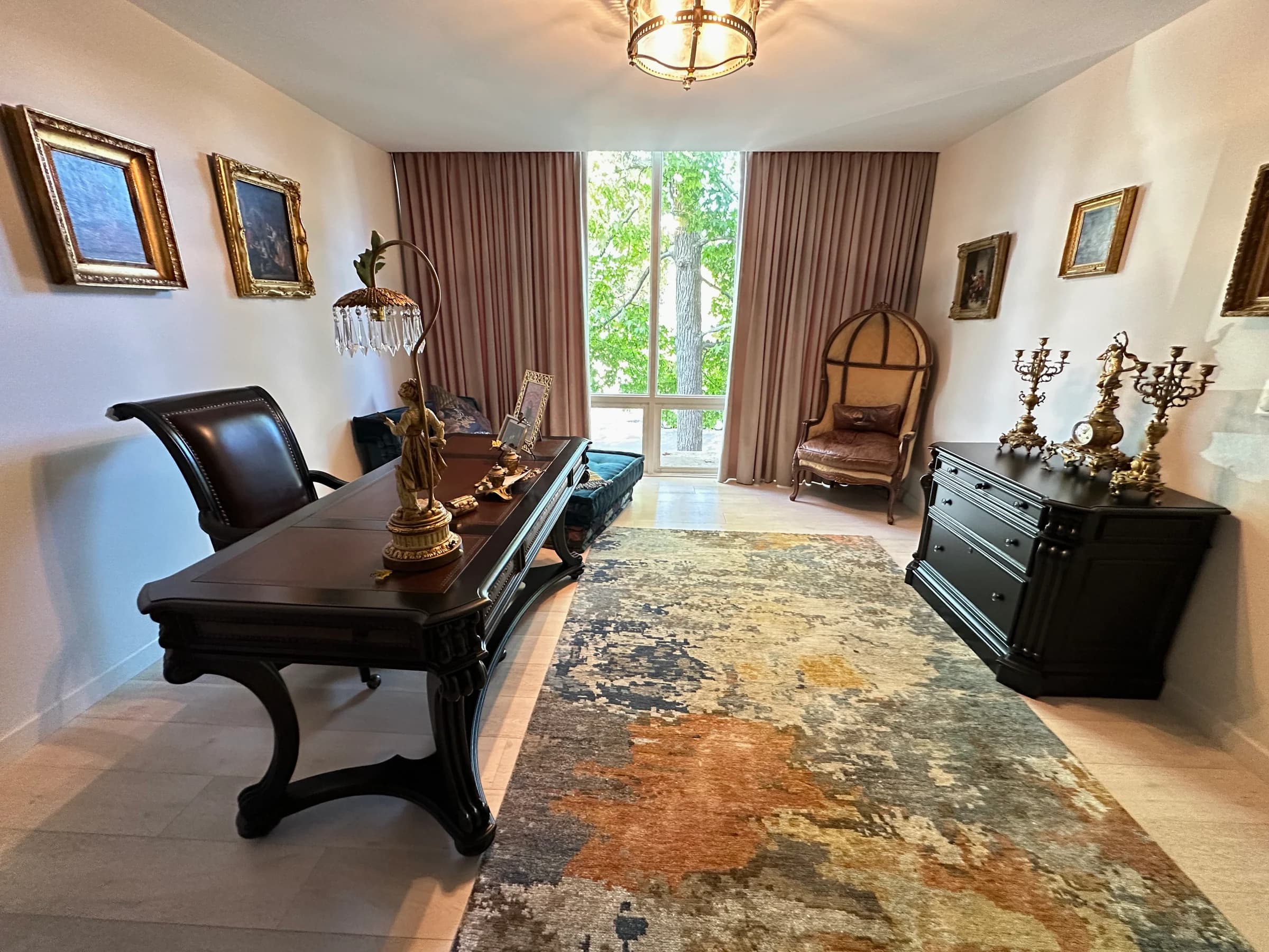 Luxury executive study with traditional furnishings, curated art, and hotel-ready finishes after cleaning